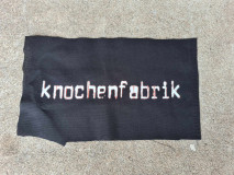 Knochenfabrik - Schrift (outline) Aufnäher